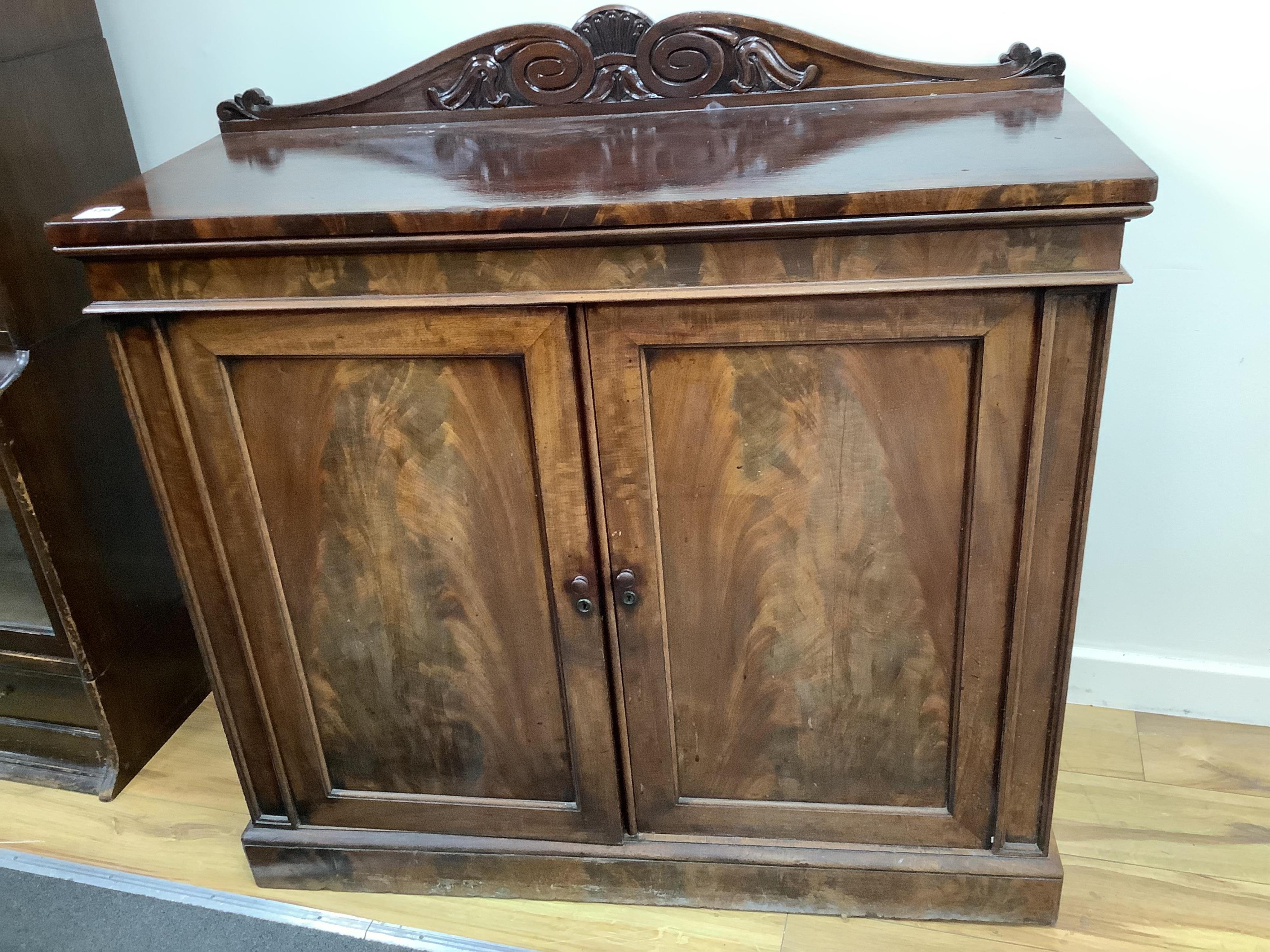 A William IV mahogany side cabinet, width 107cm, depth 43cm, height 106cm. Condition - fair